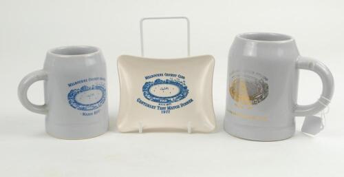 Melbourne Cricket Club. Centenary Test Match Dinner 1977’. Two ceramic tankards and ashtray with titles and details and image of the Melbourne Cricket Ground 1877 to centre. One tankard standing 4.75”, the other 4”, the ashtray approximately 5”x4”. Made b