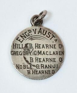 John Thomas ‘Jack’ Hearne. Middlesex & England 1888-1923. ‘Hat-trick. England v Australia, Headingley 1899’. Small silver metal medal presumably given to Hearne following his record achievement. The medal is inscribed ‘Eng v Aust. Hill. B. Hearne 0, Grego