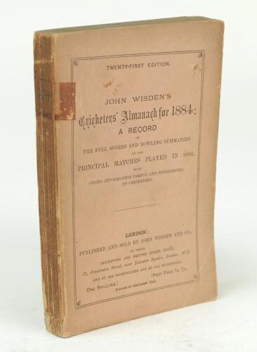 Wisden Cricketers’ Almanack 1884. 21st edition. Original paper wrappers. Some minor darkening to wrappers. Small old tape mark to the spine of the book and the edge of the wrappers, minor loss of spine paper, minor loss to top corner of the rear wrappers 