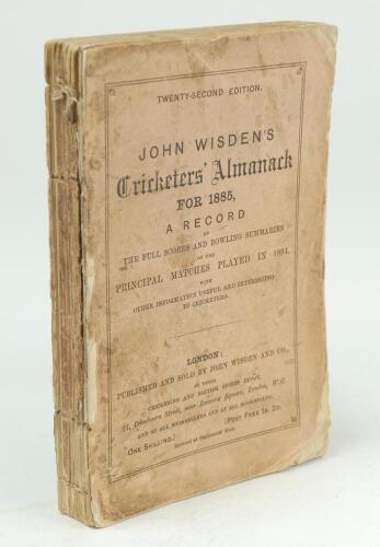 Wisden Cricketers’ Almanack 1885. 22nd edition. Original paper wrappers. Soiling, age toning and staining to wrappers and spine paper, loss to corners and wrapper extremities, rounding to corners, heavy loss to spine paper, page block breaking, page secti