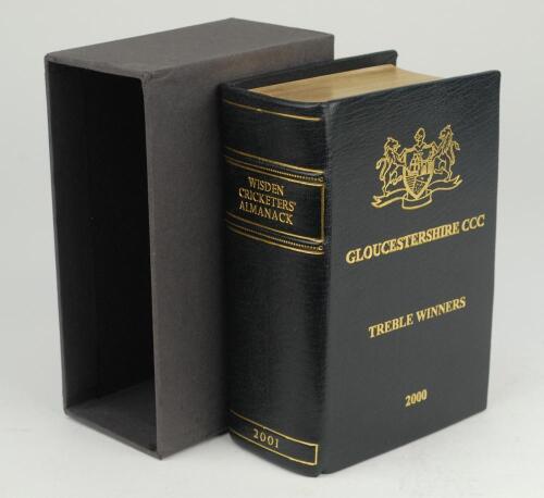 Wisden Cricketers’ Almanack 2001, 138th edition. De luxe black full leather bound edition hardback especially bound to commemorate Gloucestershire’s success with gilt lettering to spine and front board ‘Gloucestershire C.C.C. Treble Winners 2000’. Gilt to