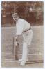 Levi George Wright. Derbyshire 1883-1909. Excellent sepia real photograph postcard of Wright standing full length in batting pose at the wicket, wearing Derbyshire cap. Foster of Brighton. Minor wear to edges, otherwise in very good condition. Sold with s