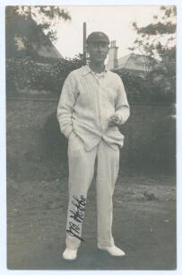 John Berry ‘Jack’ Hobbs. Surrey & England 1905-1934. Mono real photograph postcard of Hobbs standing full length wearing cricket attire and England cap, cigarette in hand. Very nicely signed in black ink to the photograph by Hobbs. Blind embossed stamp fo