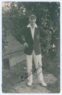 Edward Henry ‘Ted’ Bowley. Sussex & England 1912-1934. Mono real photograph postcard of Bowley standing full length wearing cricket attire, blazer and Sussex cap. Nicely signed in ink to the photograph by Bowley. Official stamp to verso for A.G. Spalding 