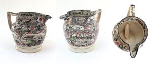 Sporting puzzle jug c 1820/30&rsquo;s. Large early ceramic puzzle jug with sporting scenes of boxing, hunting, cock fighting, horse racing, bull baiting to its sides, human rams head face to the underside of the spout. The main two cartouche panels features the