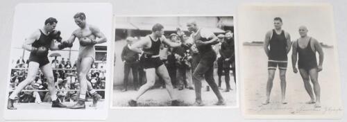 Jack Dempsey, Heavyweight Champion of the World 1919-1926. Three mono photographs of Dempsey depicted in fight action against Gene Tunney c. 1926, sparring with his partner George Godfrey, and standing on a beach with the World wrestling champion Stanisla