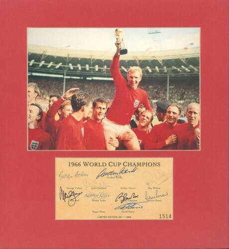 England &lsquo;1966 World Cup Champions&rsquo;. Mounted colour picture of Bobby Moore holding the World Cup and being held aloft by members of the team below this, inset into the mount, is a limited edition sheet with title and players names and signed by ten of the 