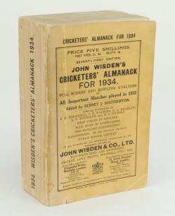 Wisden Cricketers’ Almanack 1934. 71st edition. Original paper wrappers. Some discolouration and wear to wrappers, nick to base of front wrapper, slight breaking to page block otherwise in good+ condition