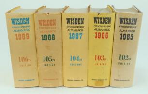 Wisden Cricketers’ Almanack 1965 to 1969. Original hardback edition with dustwrappers. All editions with age toned dustwrappers, some with tears and nicks, the 1966 edition ex libris with stamps to odd pages otherwise in good condition. Qty 5