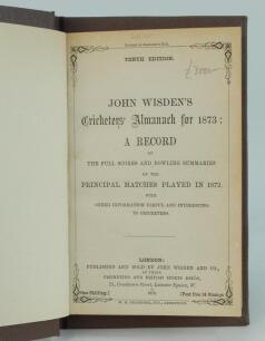 Wisden Cricketers’ Almanack 1873. 10th edition. Bound in dark brown boards, lacking original paper wrappers, with title and date in gilt to spine, red speckled page edges. Pages checked, complete. Some underlining of text in pink/red ink to seven differen