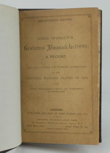 Wisden Cricketers’ Almanack 1880. 17th edition. Bound in dark brown boards, with original front paper wrapper, lacking rear, with title and date in gilt to spine, beautifully marbled page block edge. Very minor foxing to odd page otherwise in very good co