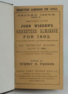 Wisden Cricketers’ Almanack 1892. 29th edition, Second Issue. Bound in dark brown boards, with original paper wrappers, with title and date in gilt to spine, beautifully marbled page block edge. Trimming a little tight to the rear wrapper by the binder ca