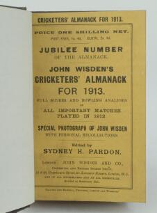 Wisden Cricketers’ Almanack 1913. 50th (Jubilee) edition. Bound in dark brown boards, with original paper wrappers, title and date in gilt to spine, beautifully marbled page block edge. Minor loss to the head of the spine on the brown boards otherwise in 