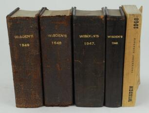 Wisden Cricketers’ Almanack 1946 to 1949. All four editions bound in dark brown boards, with original cloth covers, title and date in gilt to spine, beautifully marbled page block edge of the 1946 and 1947 editions. Some faults to the covers of the 1947 a