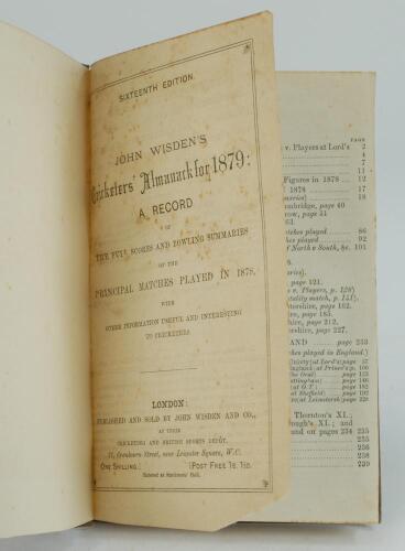 Wisden Cricketers’ Almanack 1879. 16th edition. Bound in brown boards, lacking original paper wrappers and four advertising pages at rear, with gilt titles to spine. Some foxing to the title page, trimming by the binder a little tight in places with minor