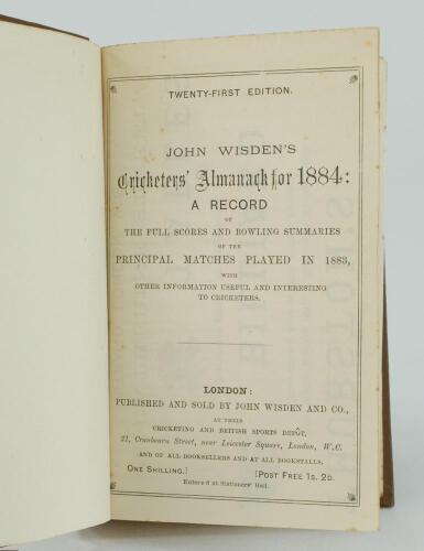 Wisden Cricketers’ Almanack 1884. 21st edition. Bound in brown boards, lacking original paper wrappers, with gilt titles to front board and spine. Lacking front advertising page, trimming by the binder a little tight in places with minor loss of text in o