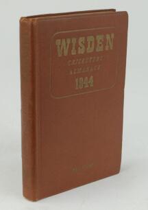 Wisden Cricketers’ Almanack 1944. 81st edition. Original hardback. Only 1500 hardback copies were printed in this war year. Dulled gilt titles on spine paper, dulling to gilt titles on the front board, general wear to boards otherwise in good condition. A