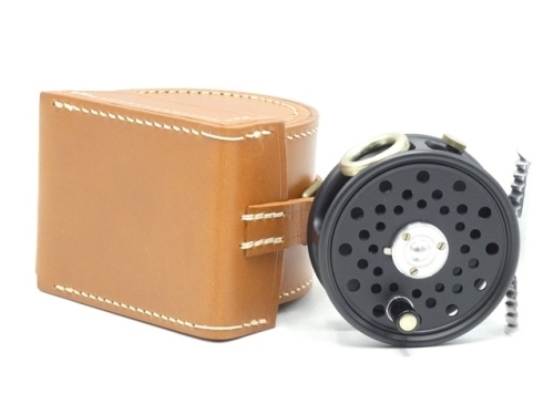 A Hardy St George Junior trout fly reel, left hand wind ltd. edition model no. 278, ebonite handle, ribbed alloy foot, white metal line guide, three screw drum latch, milled rim tension screw and Mk.II check mechanism, new/unused condition, in block leath