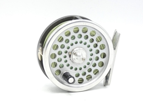 A Hardy Marquis 5 trout fly reel, composition handle, alloy foot, two screw drum latch, rear tension adjuster, little used in zip case and card box and a Chapman "Chess" 2 piece cane trout fly rod, 9', green silk wraps, sliding alloy reel fitting, in bag