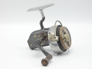 A Hardy Altex No.1 Mk.II fixed spool reel, folding ebonite right wind handle, full bail arm, ebonite drum and a Hardy "No.0 LRH Spinning" 2 piece cane spinning rod, 8'6", green silk inter-whipped, sliding alloy screw grip reel fittings, studlock joint, 1