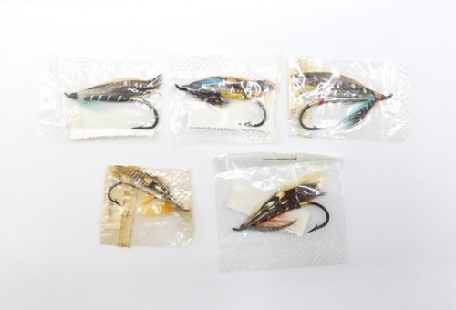 Five Hardy fully dressed eyed salmon flies in original cellophane packets, comprising 4/0 Jock Scott, Thunder & Lightning, Blue Charm and Silver Doctor and a 2/0 Torrish, each with printed pattern label (5)