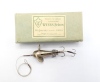 A rare Wyers Frères Devon Plongeur Argent No.3 nickel silver minnow bait, the 2" lure with twin head spinning vanes, stamped make and model details, split body with gut trace mounted triple flying treble hooks, in original card box, see Turner G.: Ultimat