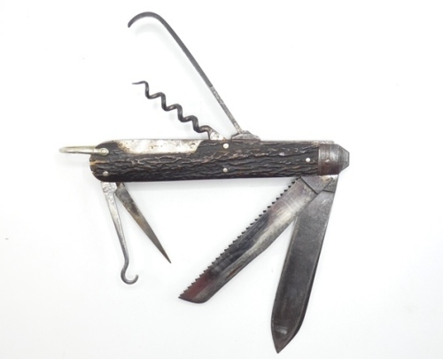 A rare G. Butler, Sheffield "Cavendish" Sorting & Fishing Knife, of large proportions and fitted nine various steel tools, main blade stamped make and model details, carved antler side panels, one with applied nickel silver shield plaque, hinged nickel si