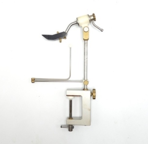 A rare Waldron LAW clamp fitting fly tying vice, brushed steel G clamp table fitting, 11" steel shaft with adjustable screw locking jaws and bobbin holder, light use only (see illustration)