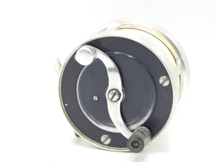 A scarce S.E. Bogdan No.2 multiplying salmon fly reel, right hand wind model with champagne/black anodised finish, counter-balanced "S" scroll handle set within an anti-foul rim, block foot, rear milled optional check button and off-set ten point graduate