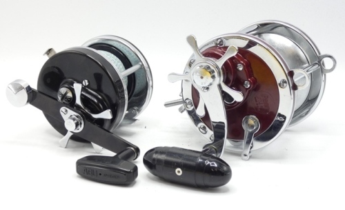 An Abu Ambassadeur 8000c bait casting reel, black finish, off-set crank handle, rear sliding optional check button, foot stramped "791000", light use only and a Penn 113H Special Senator 4/0 multiplier reel (2)