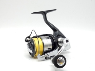 A Shimano Vanquish 2500 HGS fixed spool bass/saltwater reel, black/silver anodised finish, comfort grip handle, little used condition, in card box and a Blue Current "All Range Nano 85TZ" 2 piece carbon lure rod, 8'5", 3-21g, black/gold tipped wraps, scr