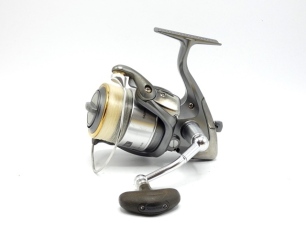 A Shimano Twin Power 4000 FA fixed spool bass/saltwater reel, graphite finish, little used, in card box and a Shimano "Exsence Zoom S-96-106M" 2 piece carbon lure rod, 9'6"-10 6", 6-40g, black silver tipped wraps, screw grip reel fitting, light use only, 