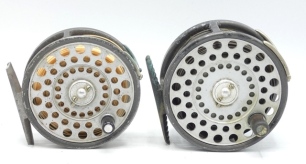 A Hardy Husky silent check trout/sea-trout fly reel, ebonite handle, ribbed brass foot, two screw spring latch and nickel silver two screw "U" shaped line guide and a similar Hardy LRH Lightweight silent check trout fly reel, both with wear from normal us