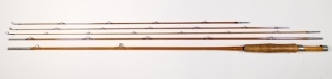 An H.L. Leonard "Tournament" 3 piece (2 tips) cane trout fly rod, 8'9", tan/brown tipped silk wraps, butternut reel seat with sliding nickel silver fittings, swollen butt, suction joints, spare tip 3" short and replacement tip ring on main tip section, i