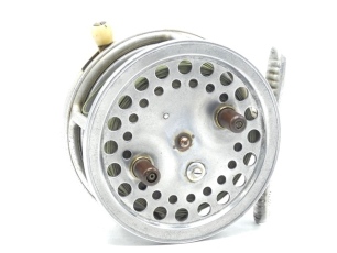 A scarce Hardy Super Silex 4" duralumin bait casting reel, shallow cored drum with twin ebonite handles, jewelled spindle bearing and spring locking latch, ribbed alloy foot, rim mounted ivorine casting trigger, milled nickel silver tension regulator and