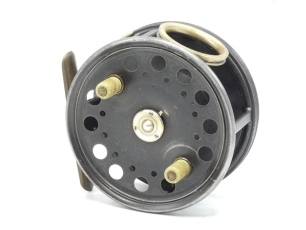 A rare Hardy St. George Salmon 4 ¼" fly reel, shallow cored drum with twin ivorine handles and three screw spring drum latch, brass foot, revolving nickel silver line guide, milled rim tension screw and silent wind-in action Mk.II check mechanism, very go