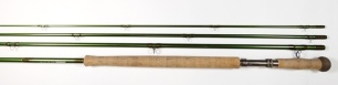 A Sage "TCX" 4 piece carbon salmon fly rod, 15', #10, green silk wraps, alloy screw grip reel fitting, light use only, in bag and alloy tube