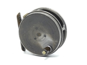 A Hardy Perfect 2 7/8" trout fly reel, ebonite handle, ribbed brass foot, milled rim tension screw and Mk.II check mechanism, light wear from normal use only, 1930's