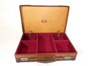 A rare Hardy Landrow rectangular leather tackle case, the attaché style cow hide case with red baize lined interior fitted five various compartments for reels, tackle etc., lid interior with applied oval red/gold trade label, outer case with twin brass ha