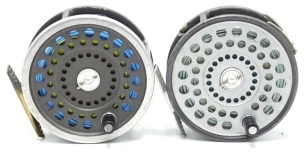 A Hardy St. Andrew salmon fly reel, composition handle, ribbed alloy foot, two screw spring latch, milled rim tension screw and dual compensating check mechanism, nickel silver "U" shaped two screw line guide and a Hardy Marquis No.2 salmon fly reel, com