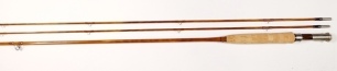 A superb Thomas & Thomas "Henry's Fork" 2 piece (2 tips) varnished flamed cane trout fly rod, 8'6", #5, light tan/crimson tipped silk wraps, American walnut reel seat with nickel silver screw grip fitting, stamped makers details, western style cork grip, 