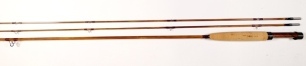 A fine Thomas & Thomas "Classic" 2 piece (2 tips) impregnated cane brook trout fly rod, 7'6", #4, mid-tan silk wraps, dark brown/crimson banded ferrule whippings, cigar shaped cork handle with polished black walnut seat and sliding blued nickel silver fi