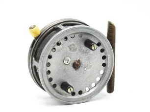 A Hardy Super Silex 3" bait casting reel, shallow slotted cored drum with twin ebonite handles, jewelled spindle bearing and spring release latch, ribbed brass foot, rim mounted ivorine casting trigger, milled tension regulator, rear ivorine quadrant wei