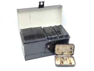 A Hardy Carry-All Minnow and Flight case, the black japanned rectangular cabinet with hinged lid and lower drawer and holding four lure boxes and two lift out tackle compartments, drop hasp lock, good overall condition, circa 1915 and a Hardy Neroda No.8 