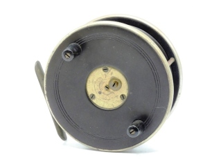 A David Slater 4 ½" ebonite combination centre pin reel, brass arboured drum with twin tapered horn handles and three screw spring drum latch, German silver rims brass four pillared annular line guide, starback foot with sliding optional check button and 