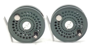 A pair of Orvis C.F.O. IV Disc Saltwater fly reels, each with green anodised finish, counter-balanced composition handles two screw drum latch, alloy foot and rear tension regulator, dual white metal line guide, new/unused condition (2)