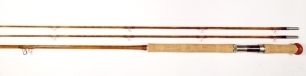 A superb Thomas & Thomas "Switch" 2 piece (2 tips) flamed and varnished cane light salmon rod, 10', #7, light tan/brown tipped silk wraps, figured black walnut reel seat with nickel silver screw grip fitting, western style double handled cork grip, reel 