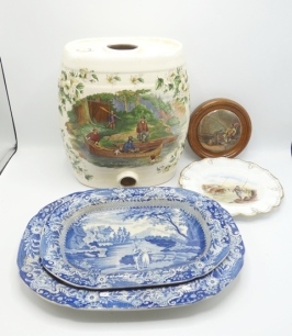 A Currier & Ives ironstone pottery sherry barrel, transfer decorated angler's embarking on canoes, titled "Starting Out", within a floral border, lacking tap and stopper, 11 ¾" high, two Brameld blue and white rectangular meat plates with angling scenes 