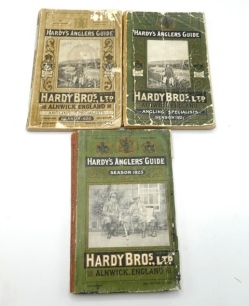 A Hardy Angler's Guide, 1920, 43rd ed., beige pict soft cover, b/w and col. illust. front cover loose and two further Hardy Angler's Guides, 1921, 44th ed. and 1923, 45th ed, covers worn (3)