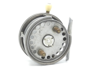 A Hardy Silex No. 2 3 ½" bait casting reel, shallow cored drum with twin ebonite handles and three screw spring latch, alloy foot, cut-away rim section, ivorine rim mounted casting trigger and milled tension regulator screw, light wear from normal use, c